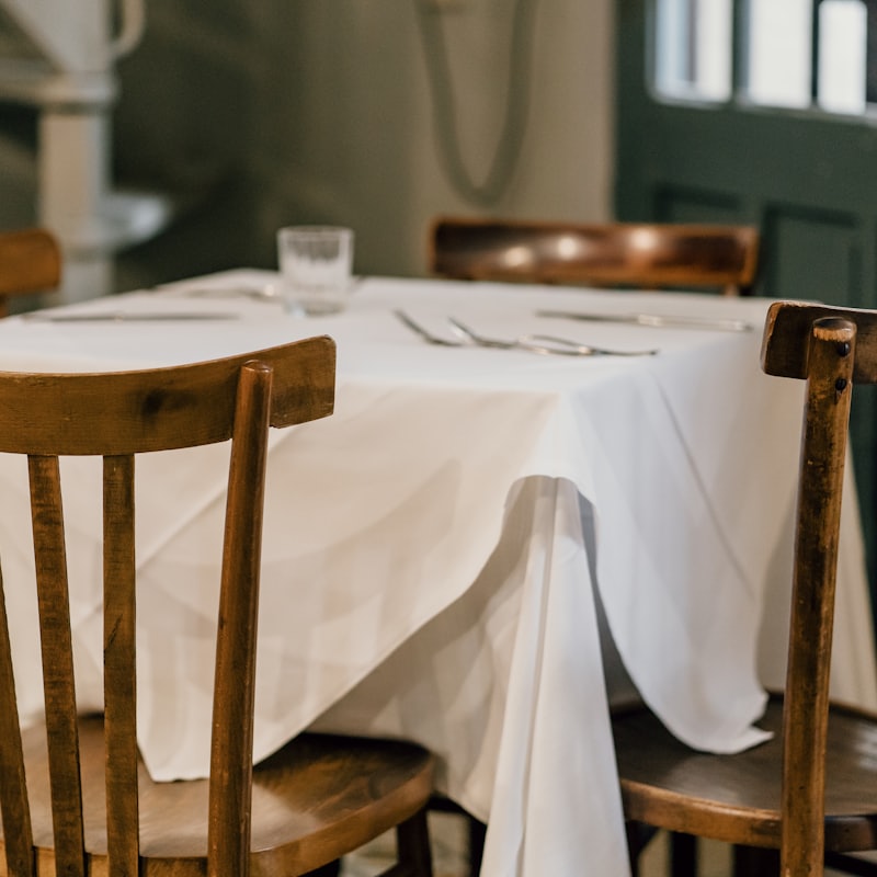 Table dressed with a vintage linen tablecloth