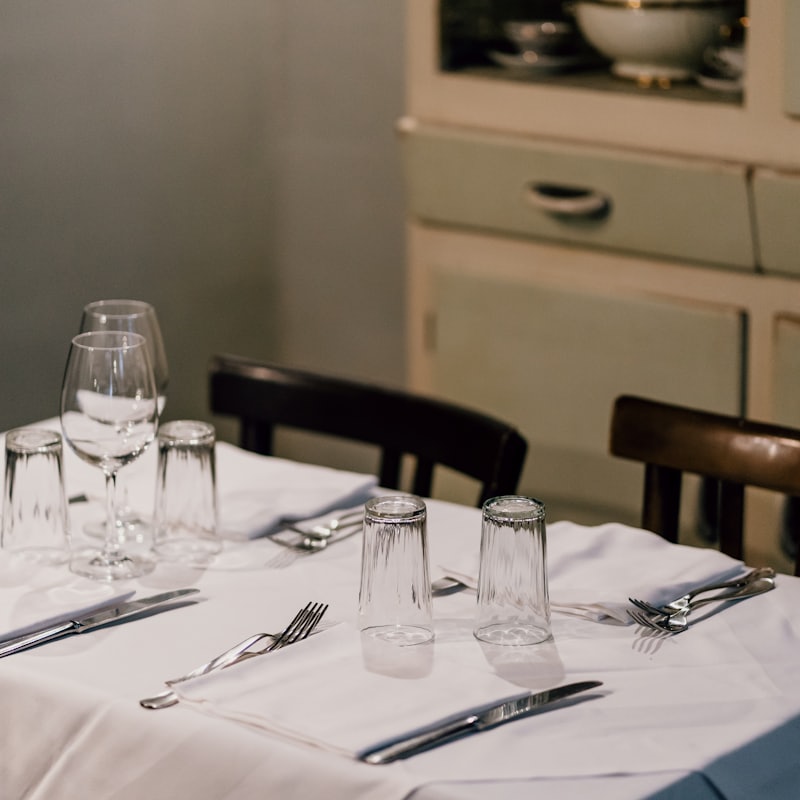 Place setting with etched glassware and cutlery